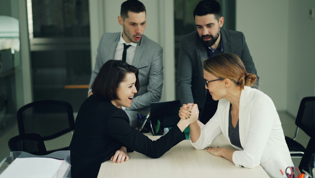 business people shaking hands in meeting